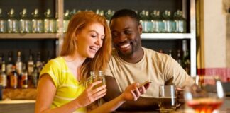 Nice couple enjoy a cocktail on a date