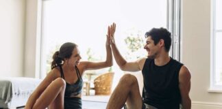 Couple exercising together as their couples morning routine