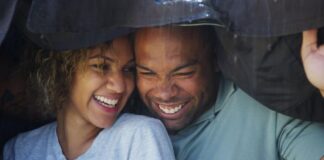 happy couple under the rain