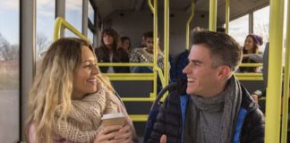 man and woman having a small talk on the bus