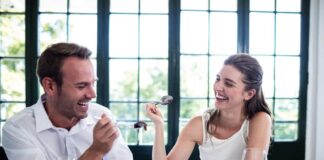 sweet couple laughing in a restaurant