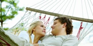 a long-termed couple laying on a hammock