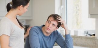 Two people in the kitchen are calculating the financial business