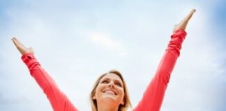 happy woman wearing pink long sleeve