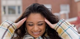 a woman suffering from an intense headache