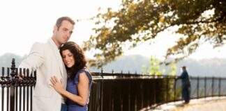 couple hugging in the park on a path