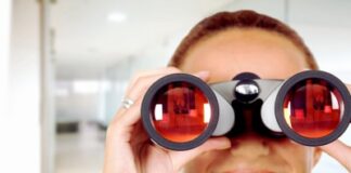 young lady on binoculars