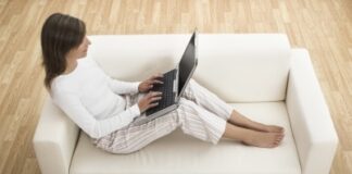 woman working at home with her laptop