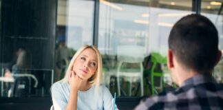 woman looking at her date, intently