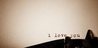 A typewriter has typed out "i love you" in love letters for him