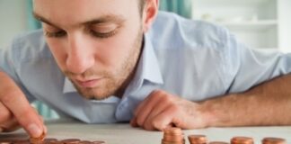 man counting his coins