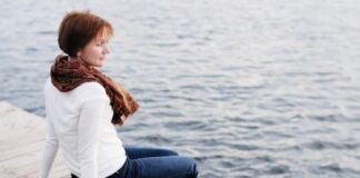 alone woman on dock