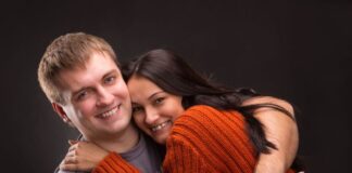 blonde guy with his ex girlfriend hugging each other