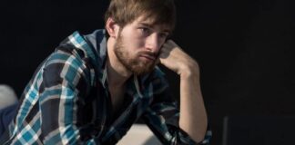 young man thinking deeply
