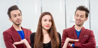 woman in between two men having a hard time choosing