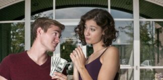 boyfriend giving money to his girlfriend