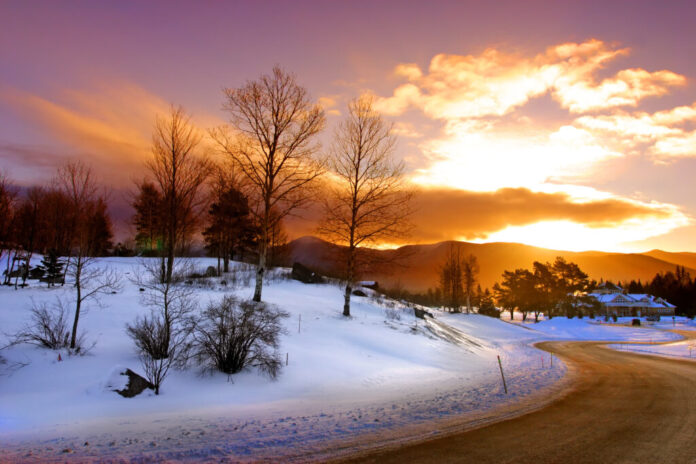 A snowy road is the perfect setting for some of the most romantic cabins in Vermont