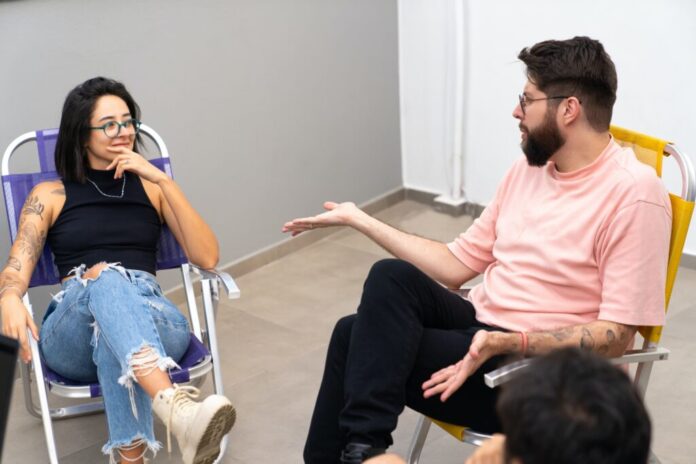 mentor talking to woman