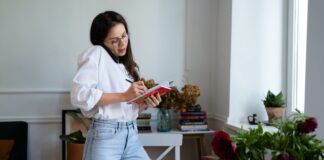 woman writing in a notebook