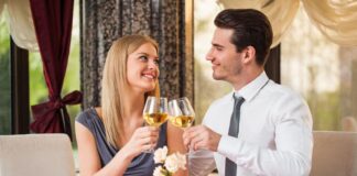 young couple on a date, drinking wine