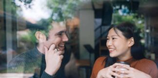 couple talking with each other at a coffee shop