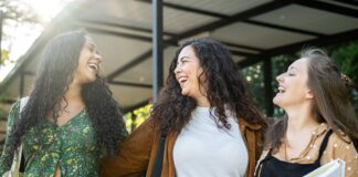 three women laughing